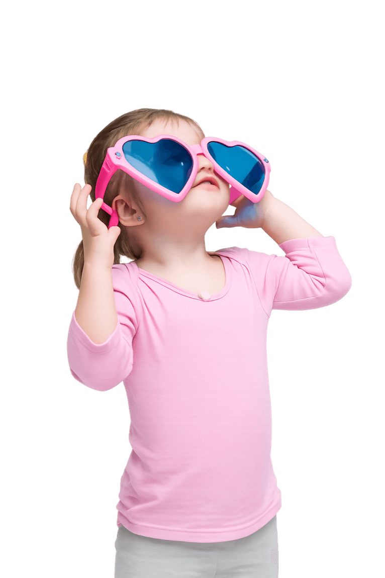 A happy child in heart-shaped sunglasses